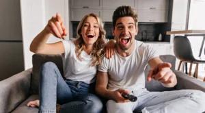 Happy family watching TV after fixing the issue