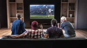 Family watching TV together